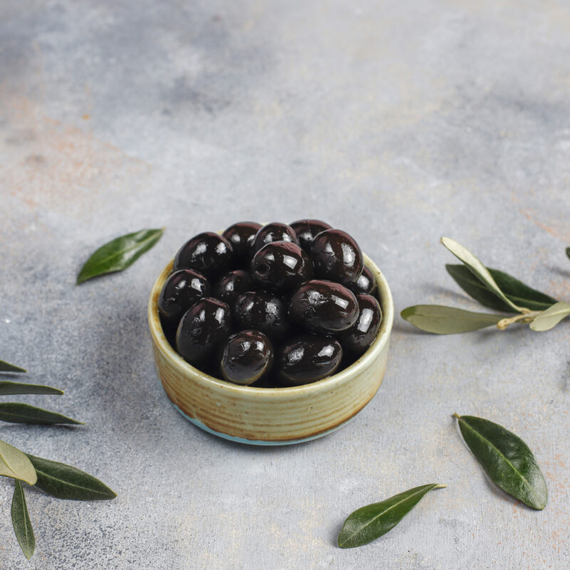 Variety of green and black whole olives. Variety of green and black whole olives.